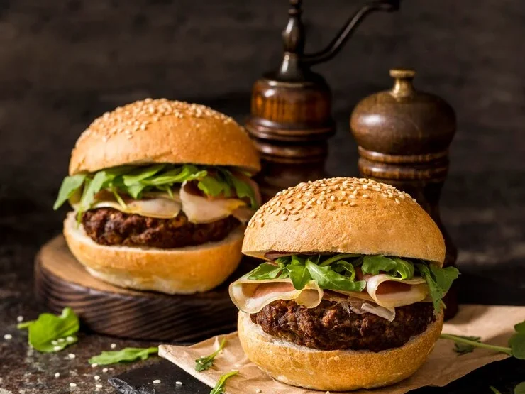 front view beef burgers with bacon slate board 23 2148784477