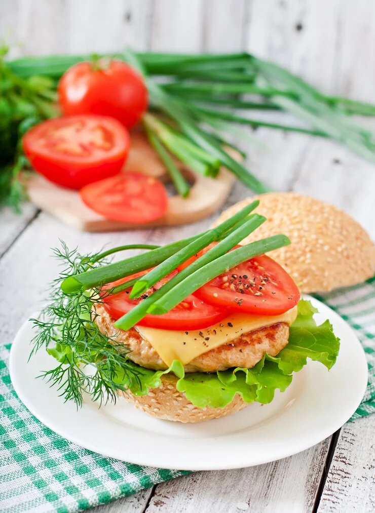 sandwich with chicken burger tomatoes cheese lettuce 2829 11882