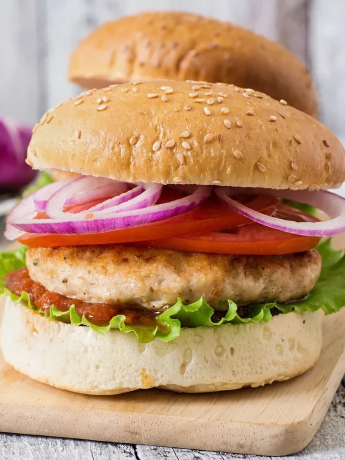 sandwich with chicken burger tomatoes red onion lettuce 2829 11151
